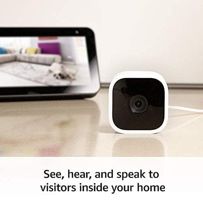 Blink Mini – Compact indoor plug-in smart security camera, 1080p HD video, night vision, motion detection, two-way audio, easy set up, Works with Alexa – 1 camera (White)-UPStoxs